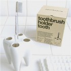 Toothbrush holder tooth